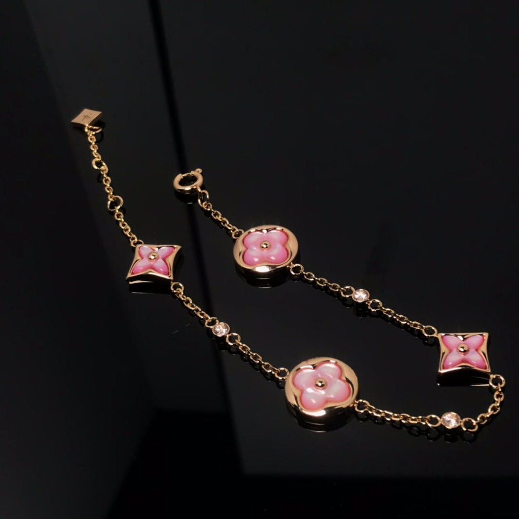 TimiSTAR AND SUN 4 MOTIF PINK MOP PINK GOLD BRACELET