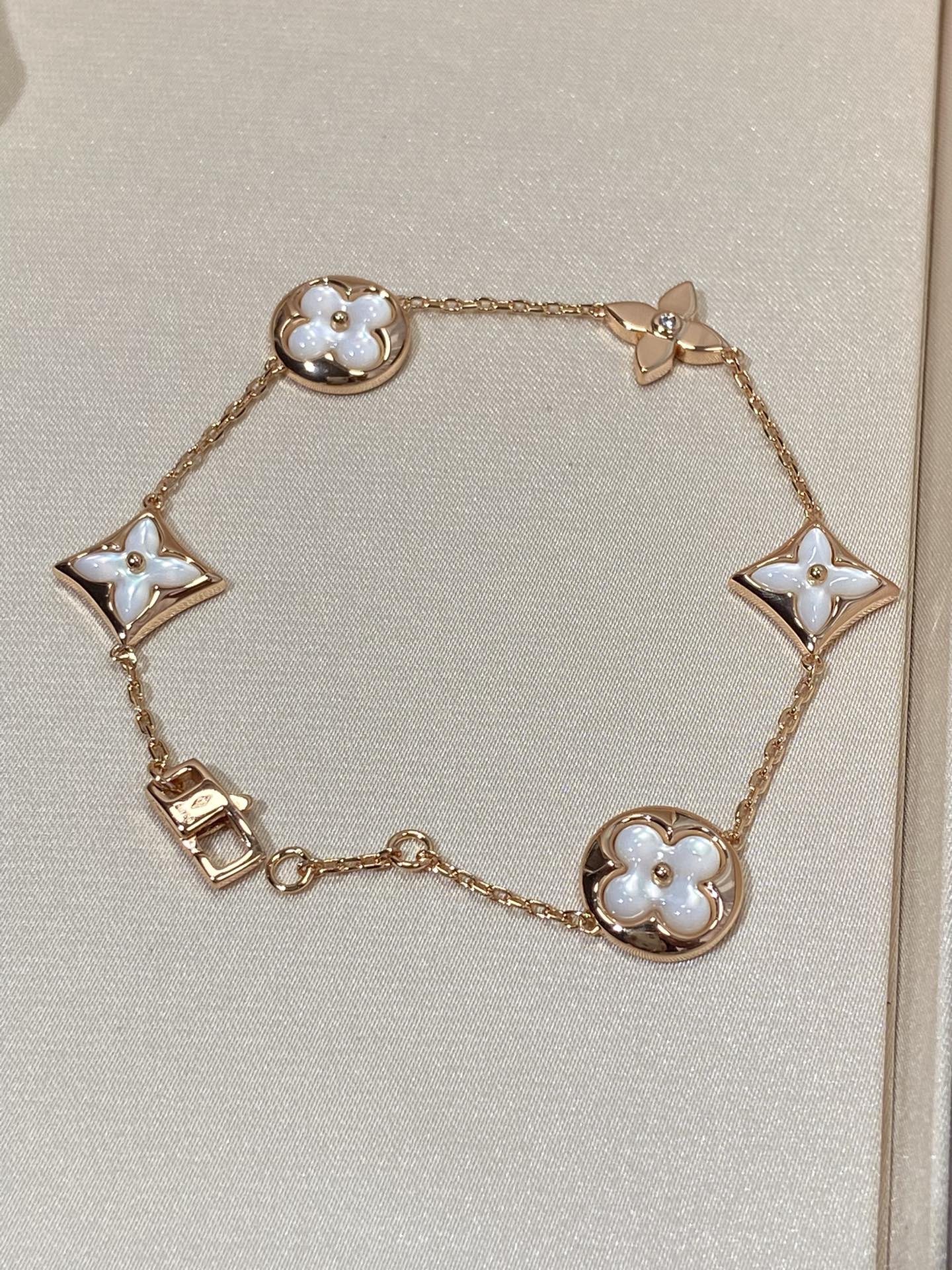 TimiSTAR AND SUN 5 MOTIF MOP PINK GOLD BRACELET
