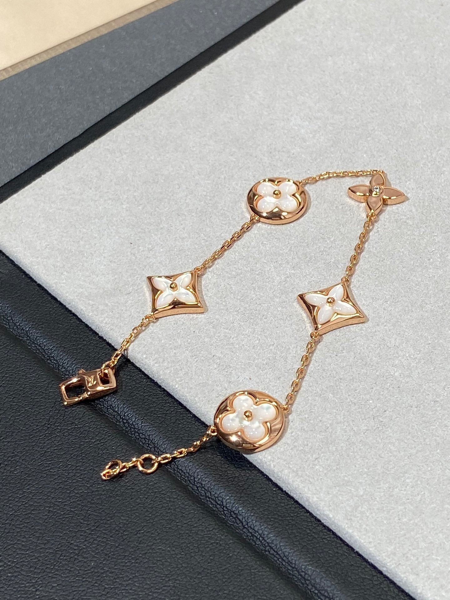 TimiSTAR AND SUN 5 MOTIF MOP PINK GOLD BRACELET