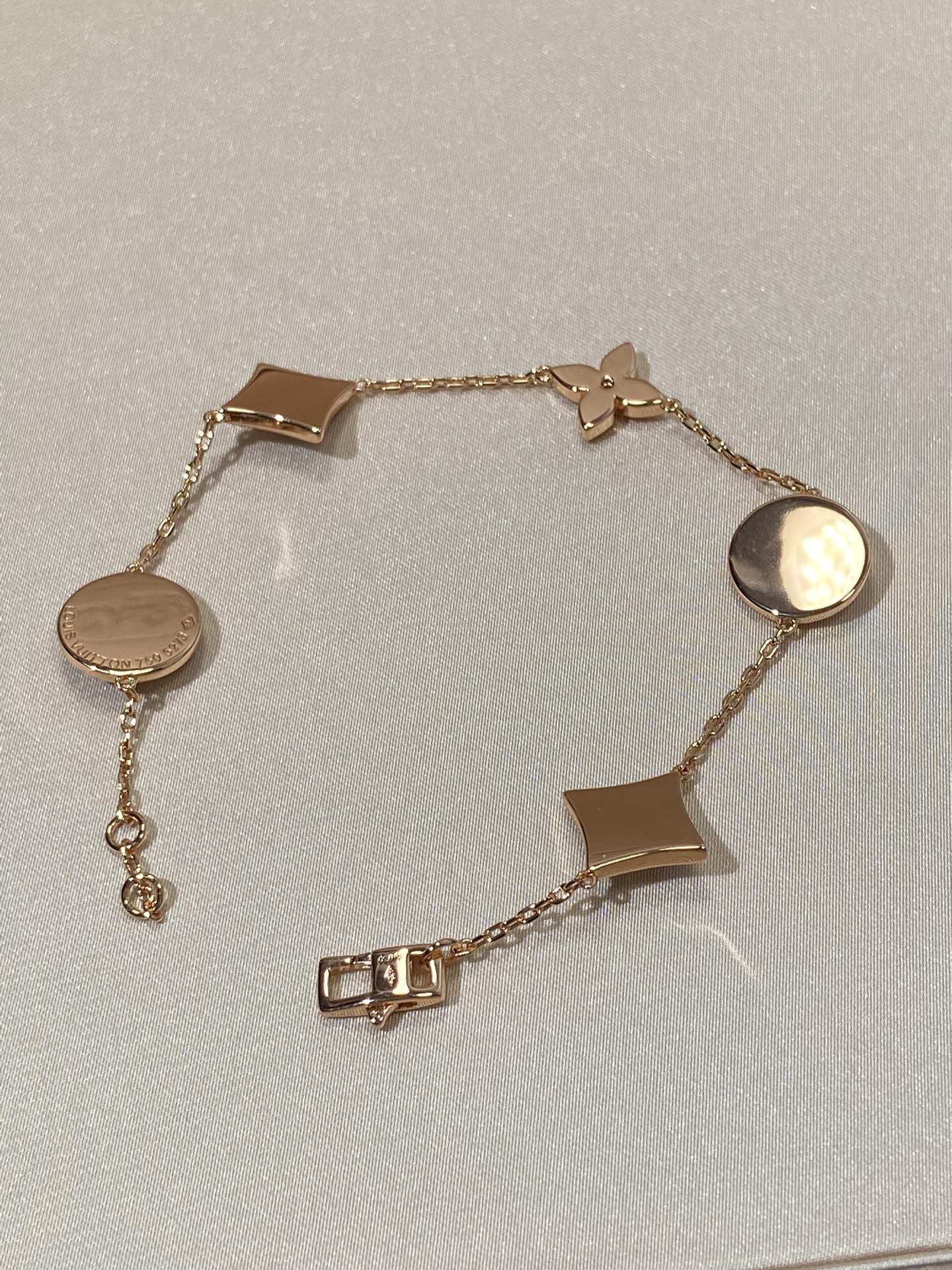 TimiSTAR AND SUN 5 MOTIF MOP PINK GOLD BRACELET