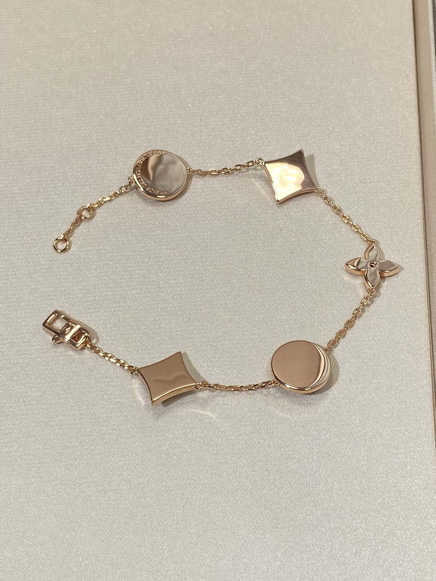 TimiSTAR AND SUN 5 MOTIF MOP PINK GOLD BRACELET