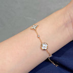 TimiSTAR AND SUN 4 MOTIF WHITE MOP PINK GOLD BRACELET