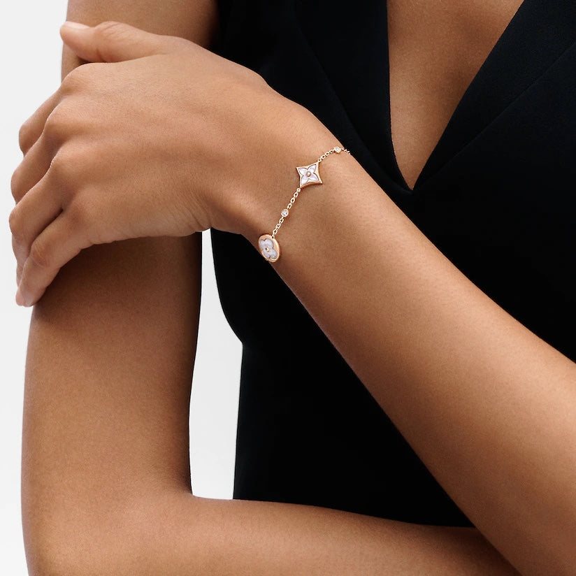 TimiSTAR AND SUN 4 MOTIF WHITE MOP PINK GOLD BRACELET